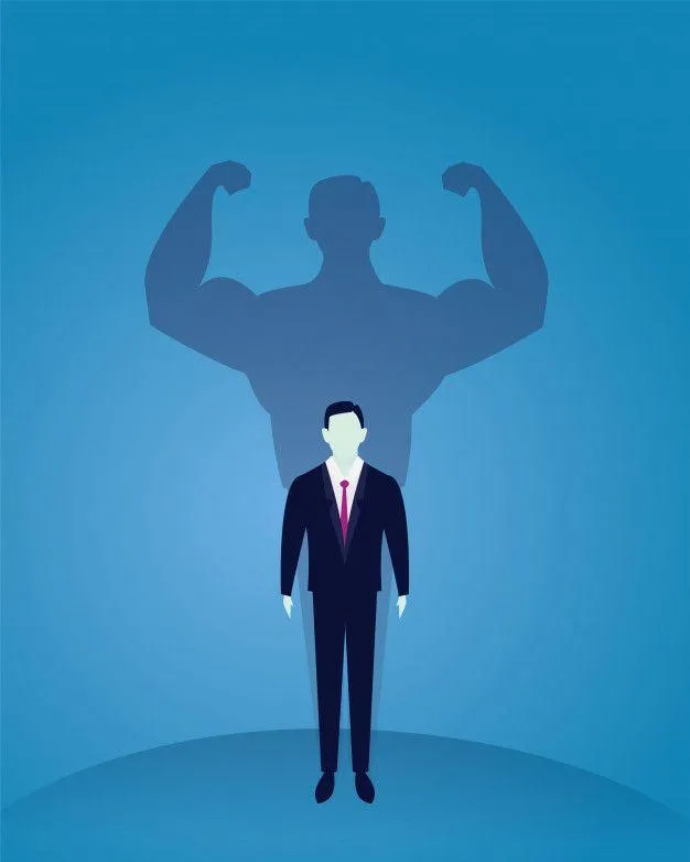Businessman With a Strong Shadow Symbolizing Inner Power