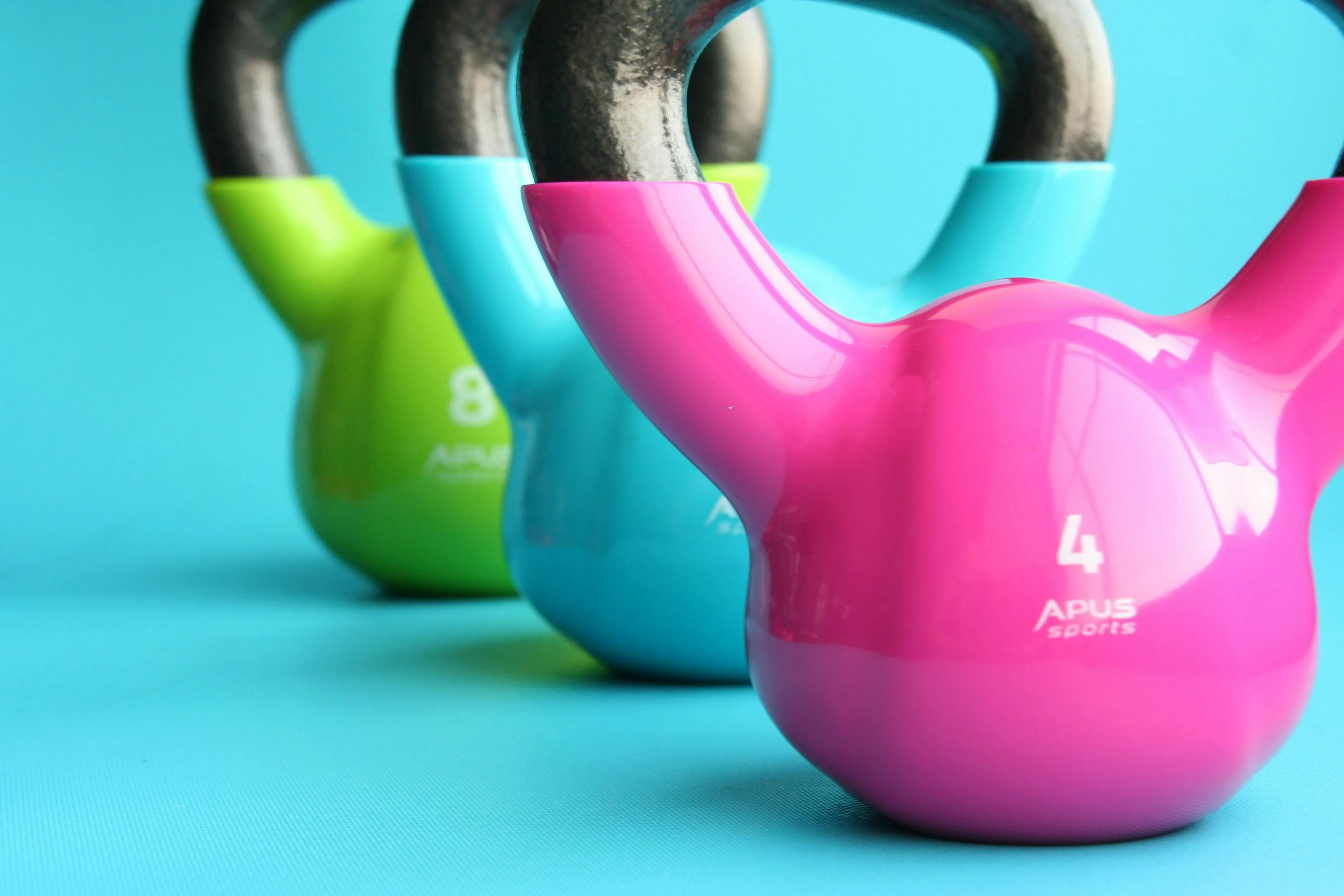 Colorful Kettlebells Ready For a Full Body Workout Session