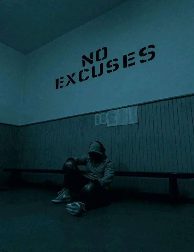 Dark Moody Gym Scene With No Excuses Motivational Message