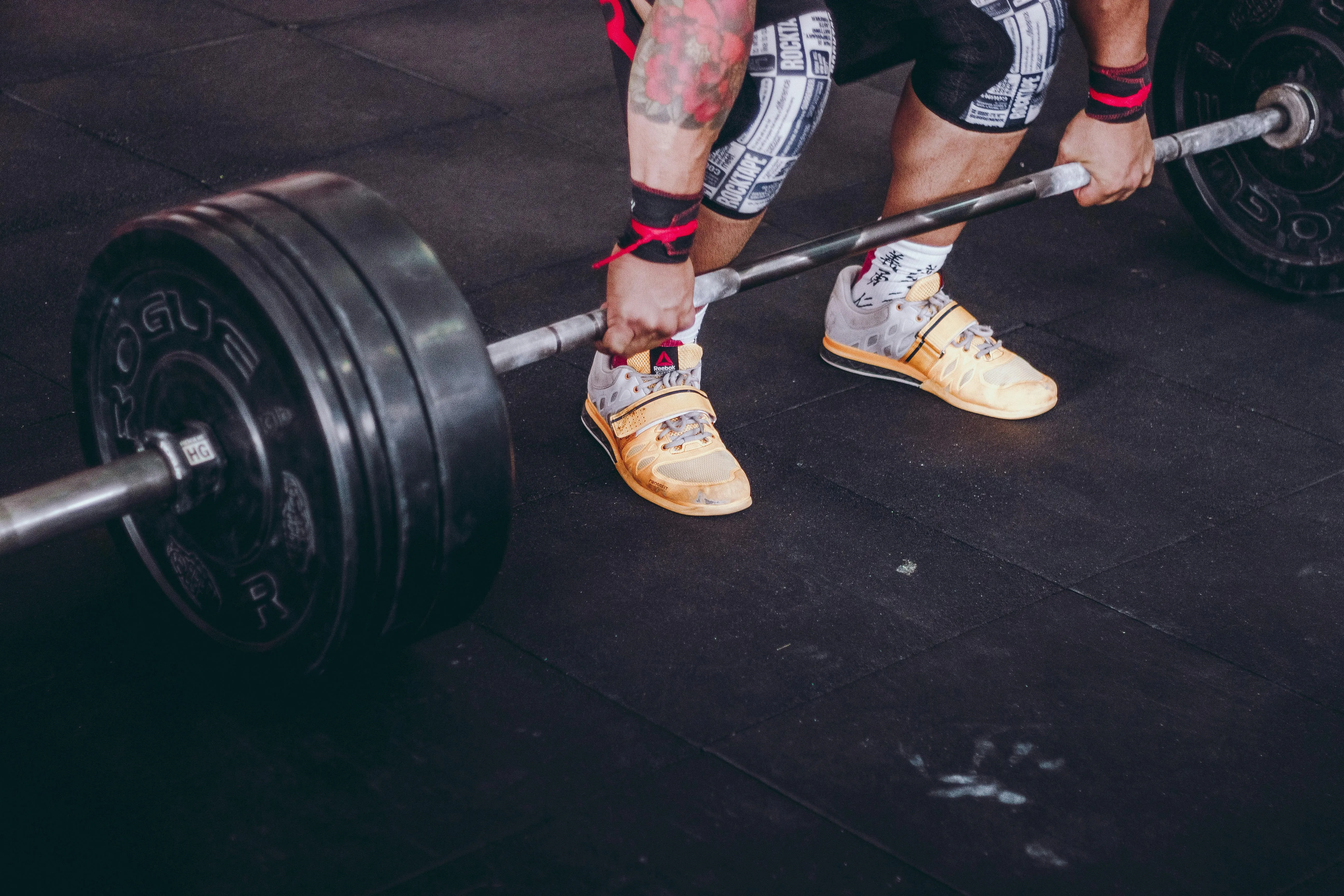 Feet Close Up While Lifting a Barbell During Power Training
