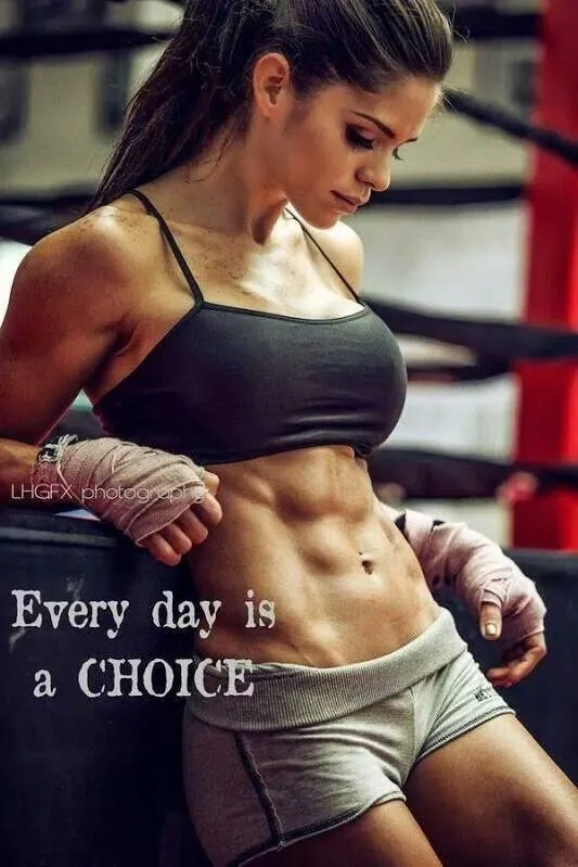 Fit Woman in Boxing Gym With Motivational Quote Overlay