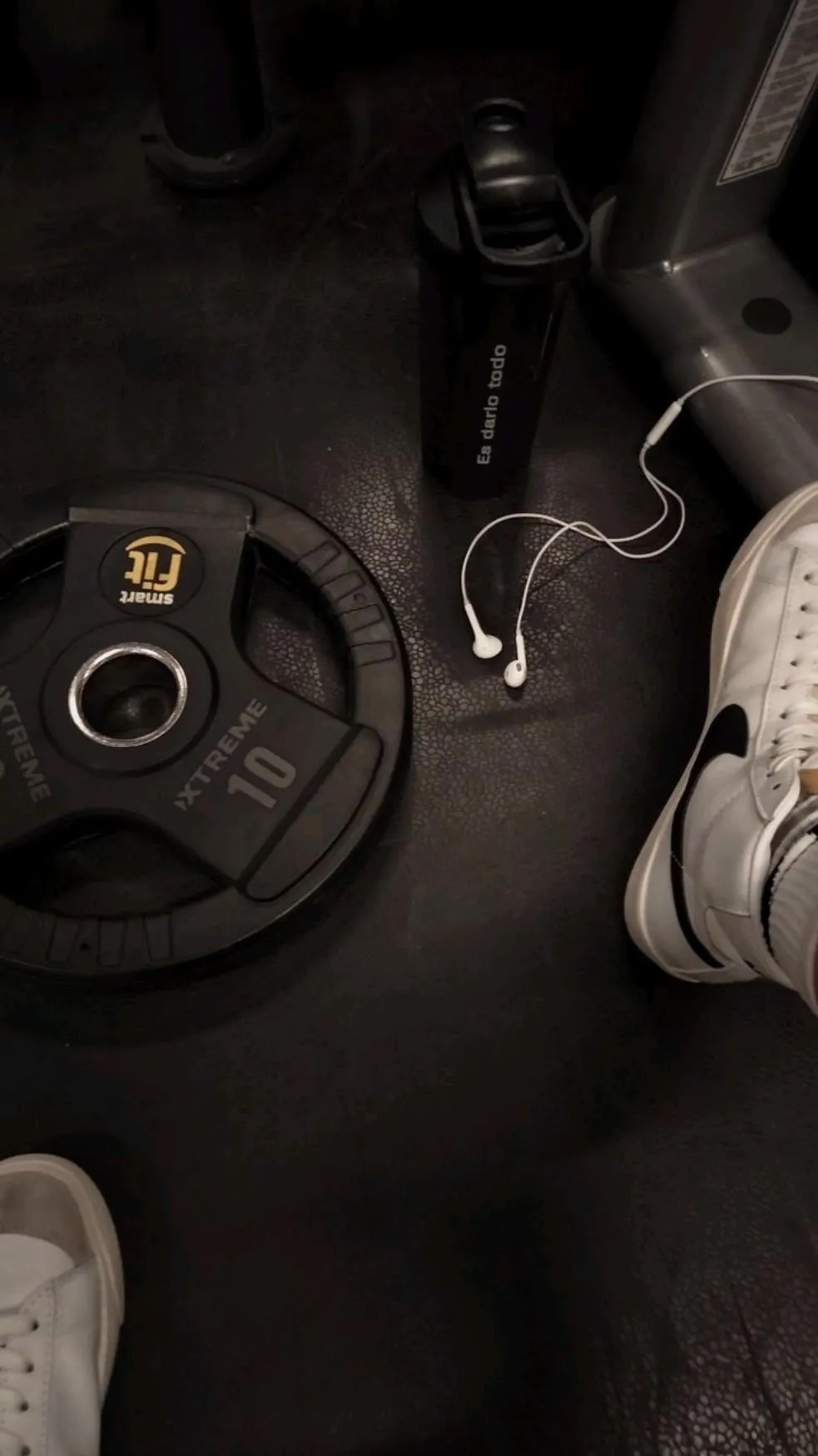 Gym Weights and Gear on the Floor in a Gritty Workout Vibe