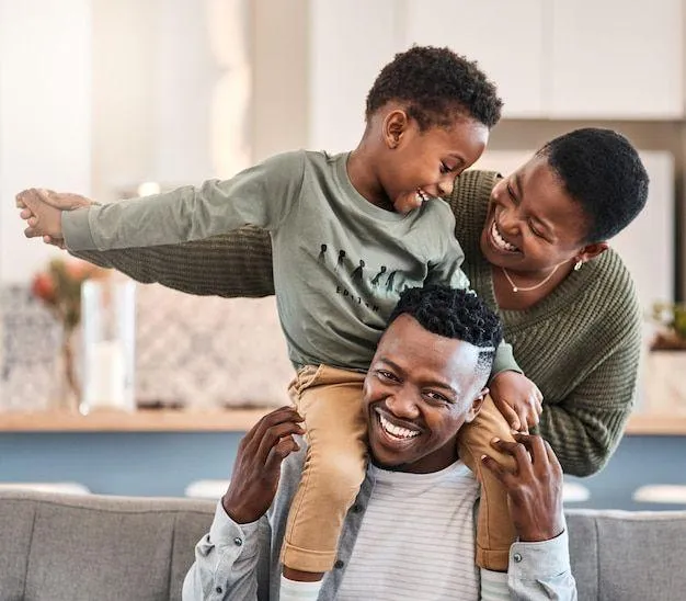 Happy Family Playing and Smiling Together in the Living Room