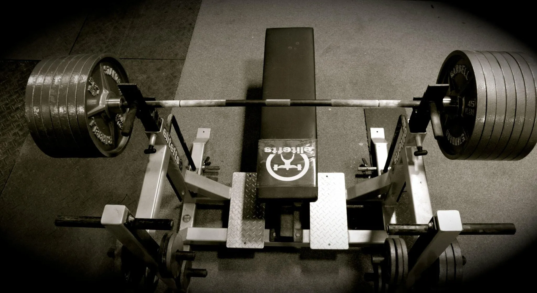 Heavy Barbell Loaded on the Leg Press Machine For Strength