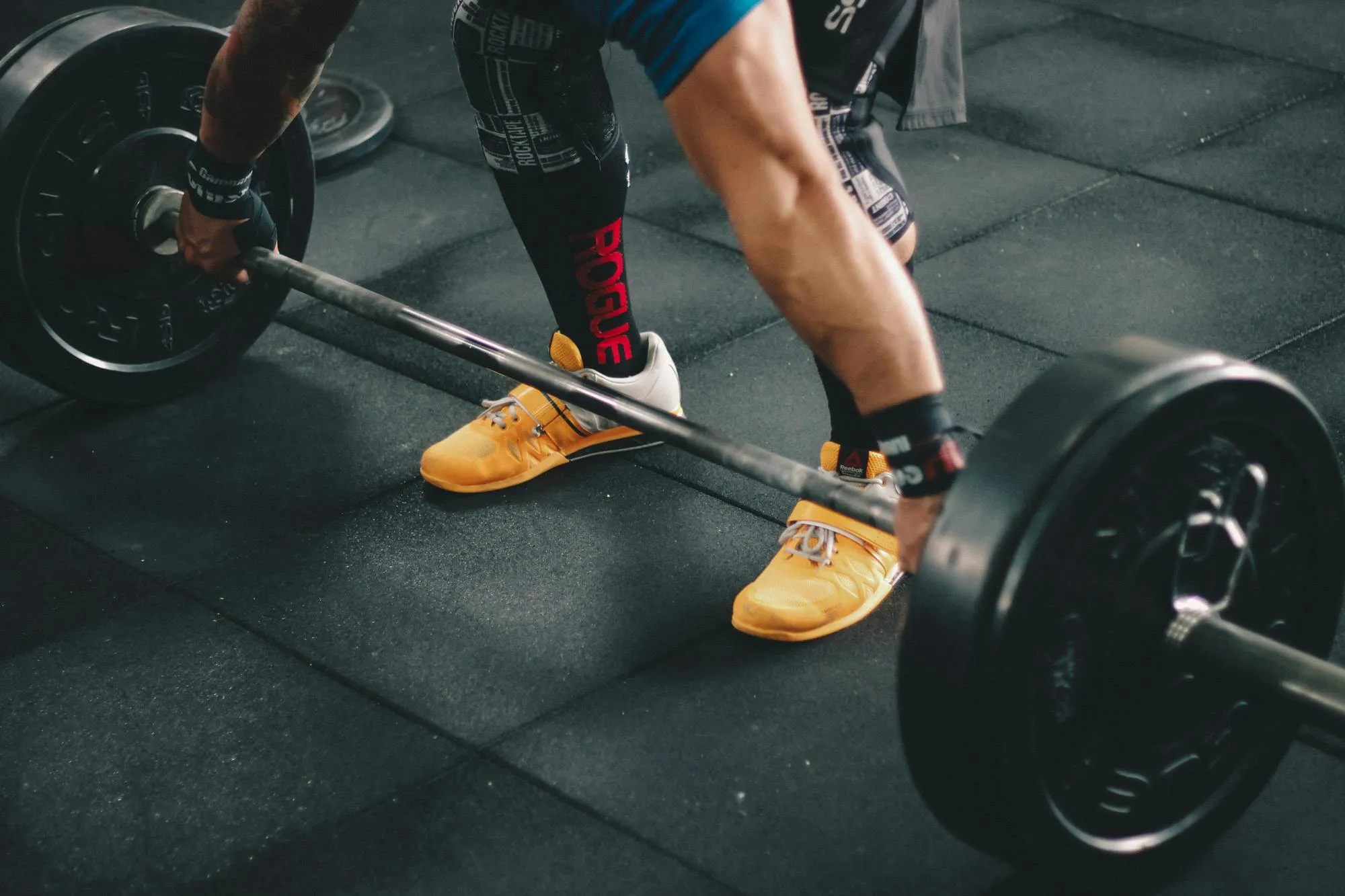 Legs Lifting Barbell Off the Floor During an Intense Workout