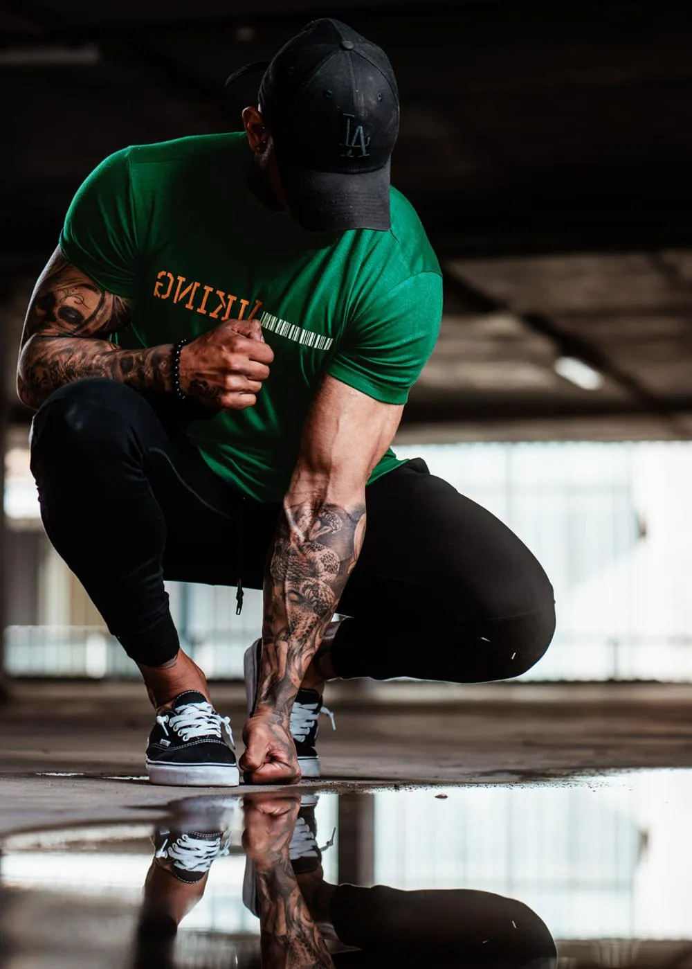 Man Checking Reflection in a Puddle After Running Wallpaper