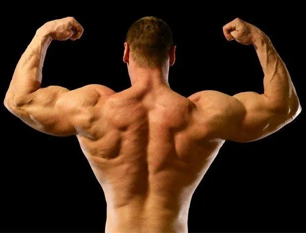 Man Flexing Back Muscles After Intense Bodybuilding Workout