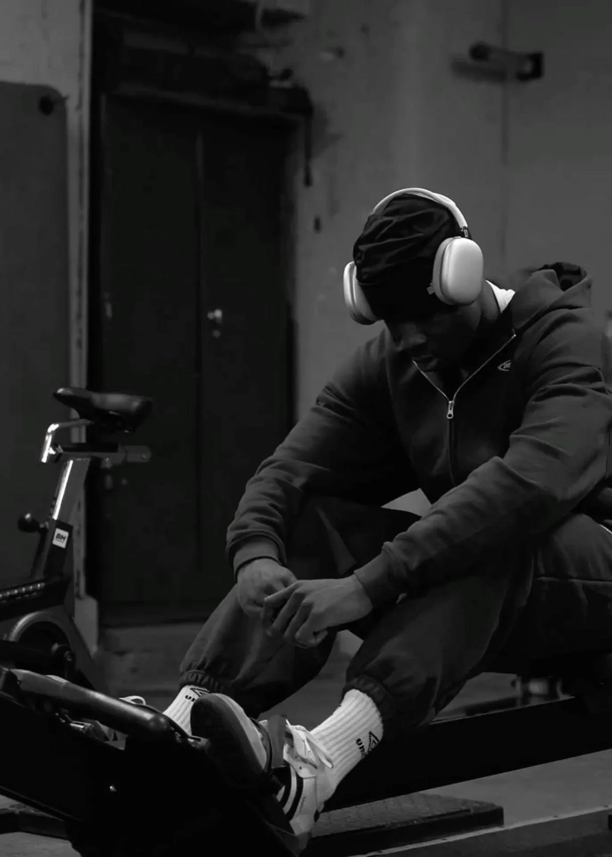 Man Resting With Headphones on After an Intense Workout