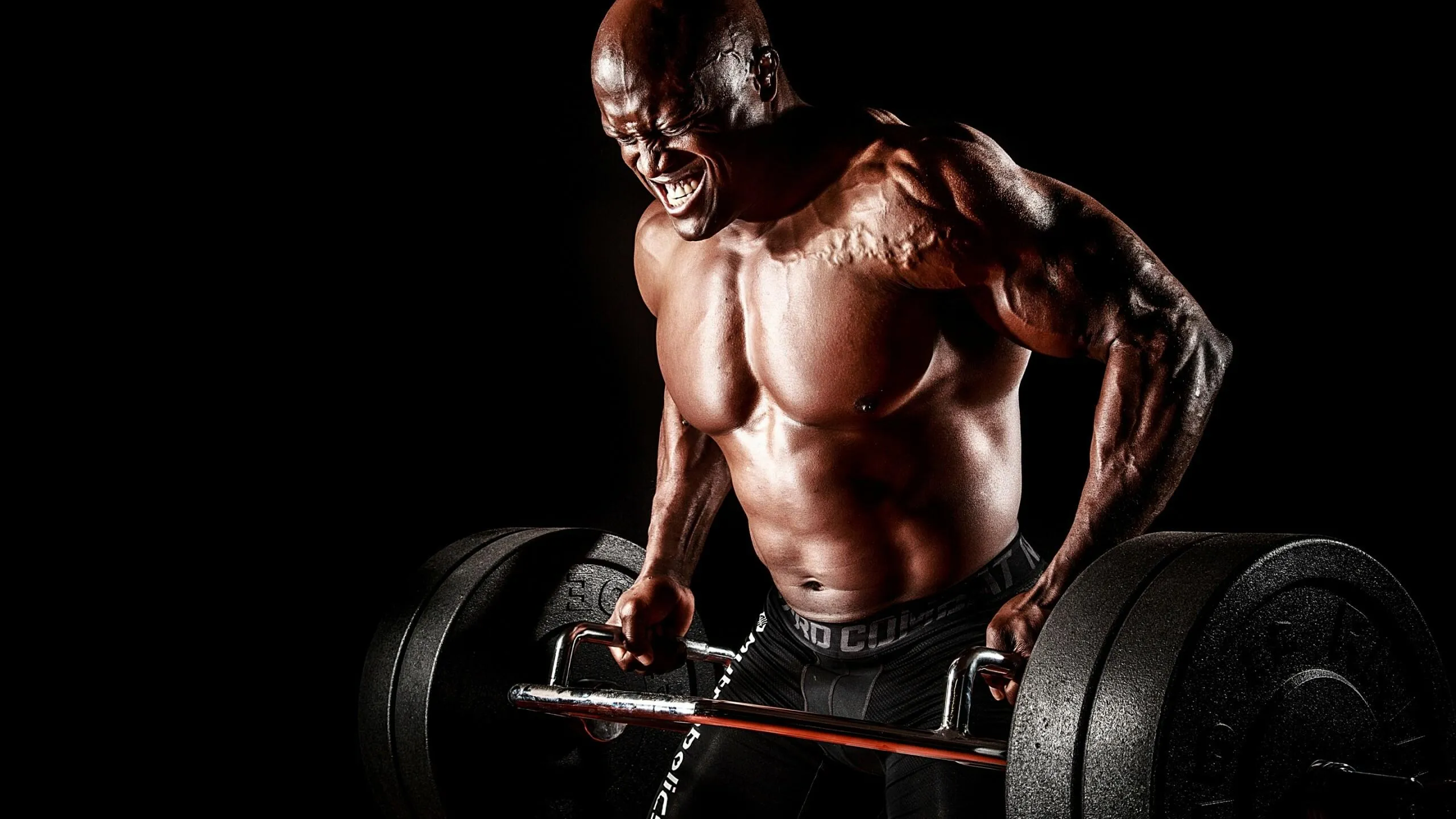 Muscular Man Doing Bent Over Rows With Heavy Barbell Weight