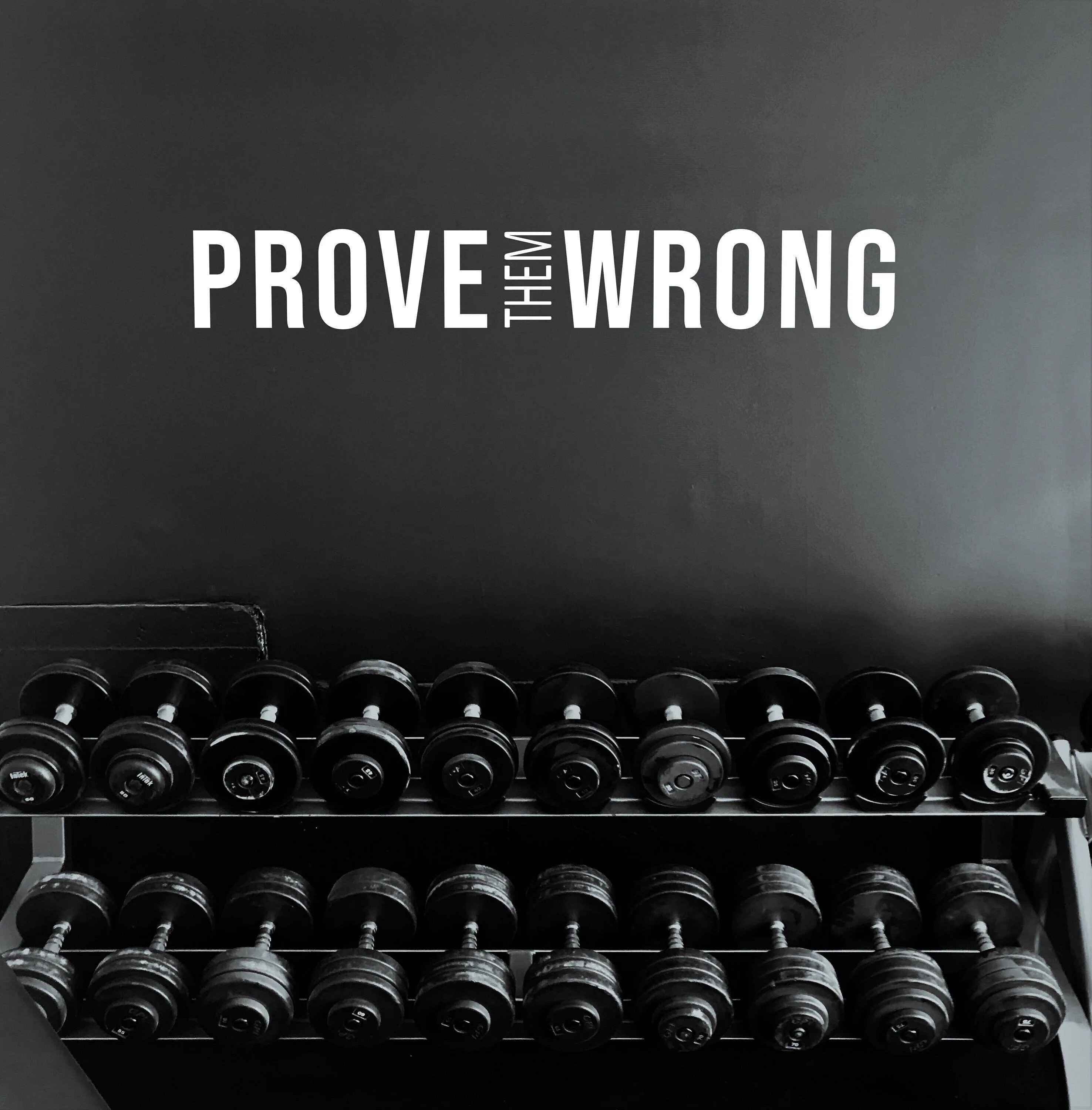 Prove Them Wrong Text Over Dumbbells Motivation Wallpaper