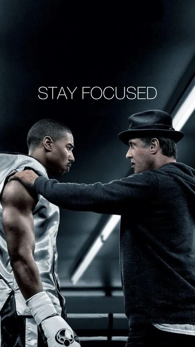 Two Men Staying Focused in the Gym During Boxing Training