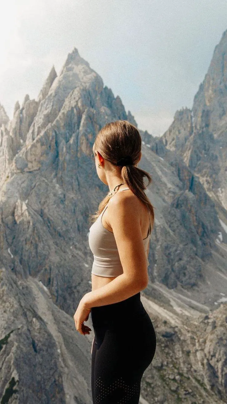 Woman Hiking and Enjoying the Mountain View With Calmness