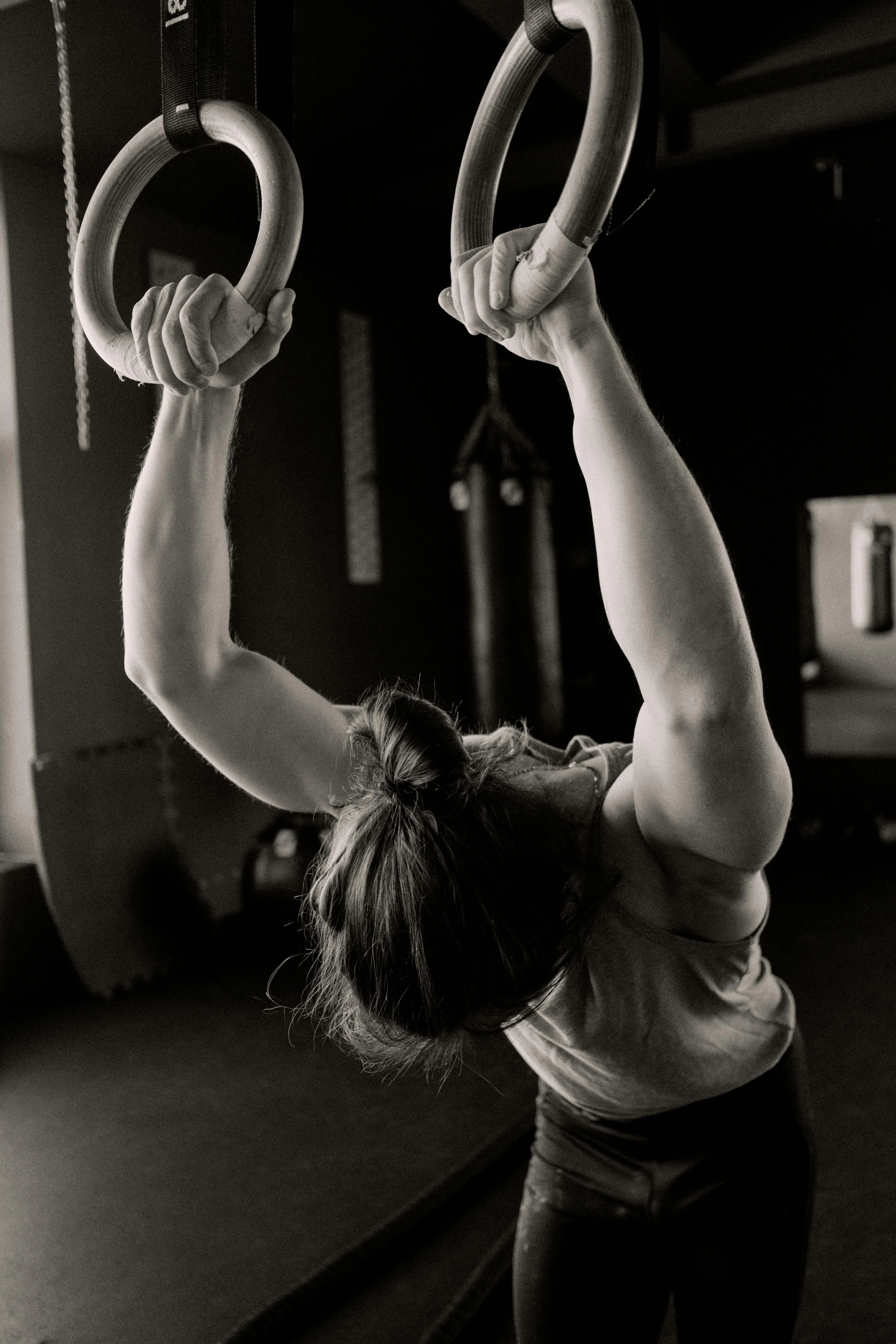 Woman Training With Gymnastic Rings an Upper Body Workout