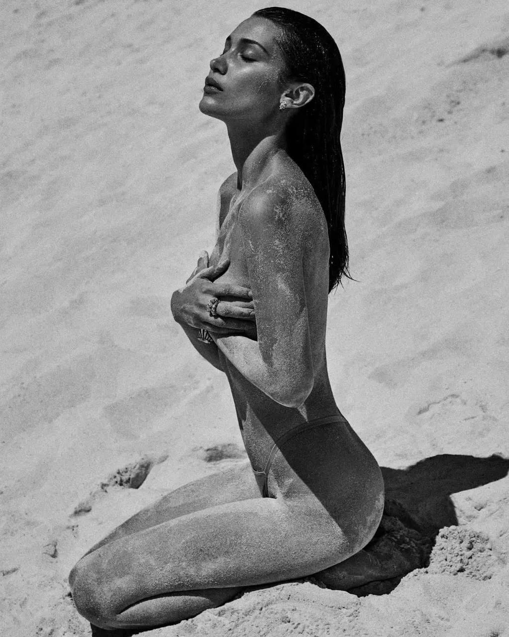 Artistic Black And White Photo of a Nude Woman on a Beach