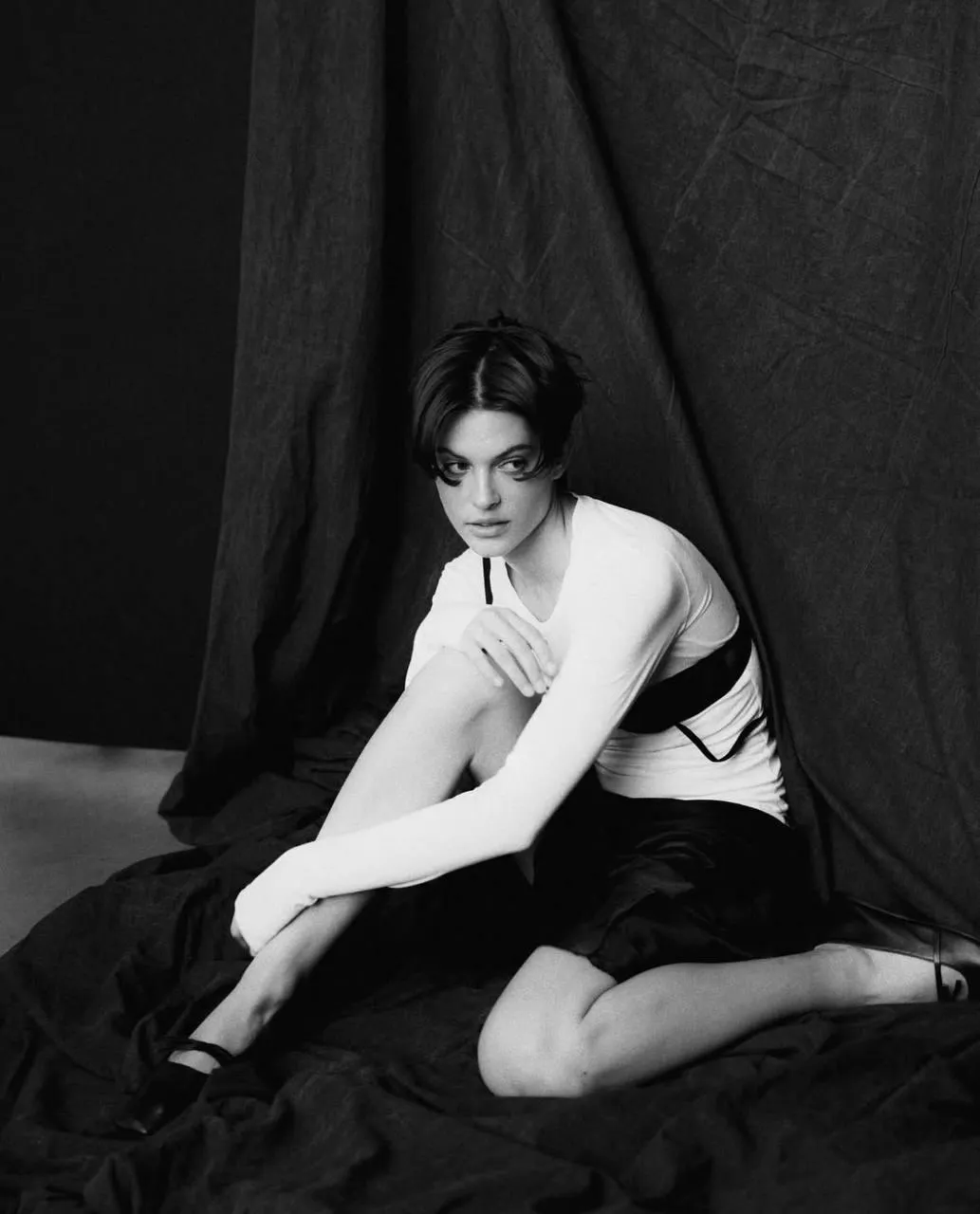 Artistic Black And White Photo of Woman Sitting on the Floor