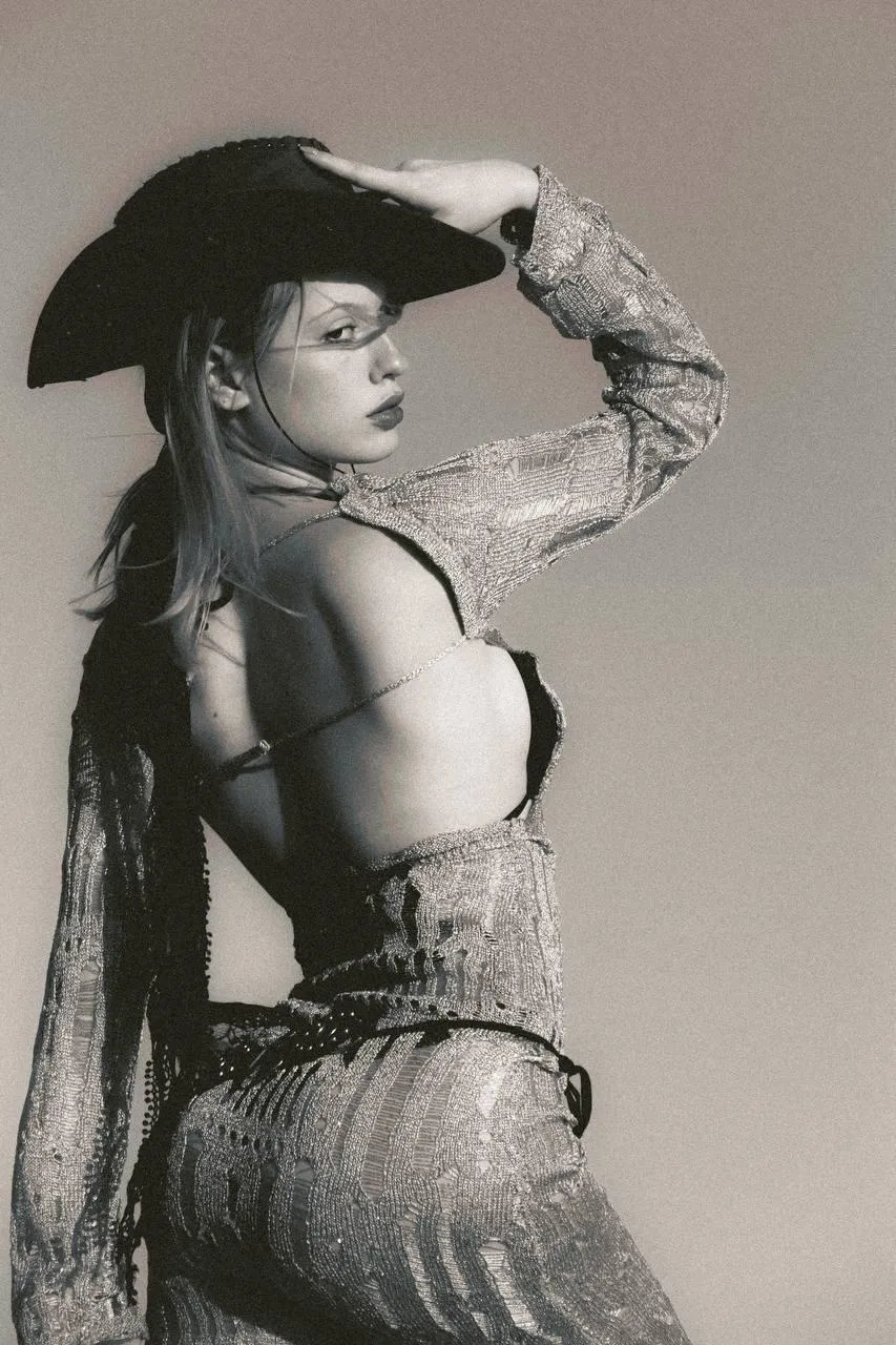 Artistic Black And White Portrait of a Woman in a Hat Image