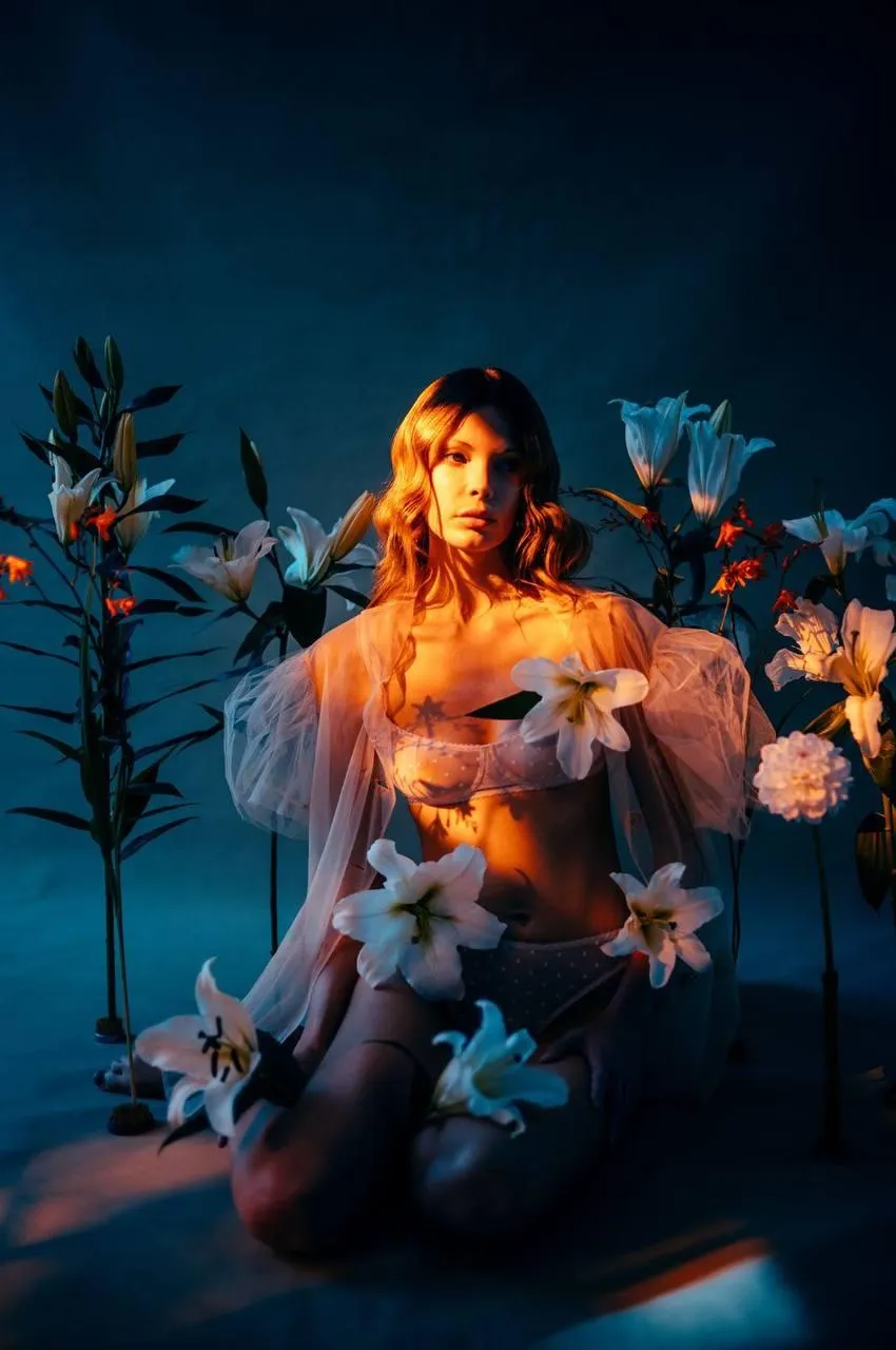 Artistic floral themed shoot with colorful lighting image