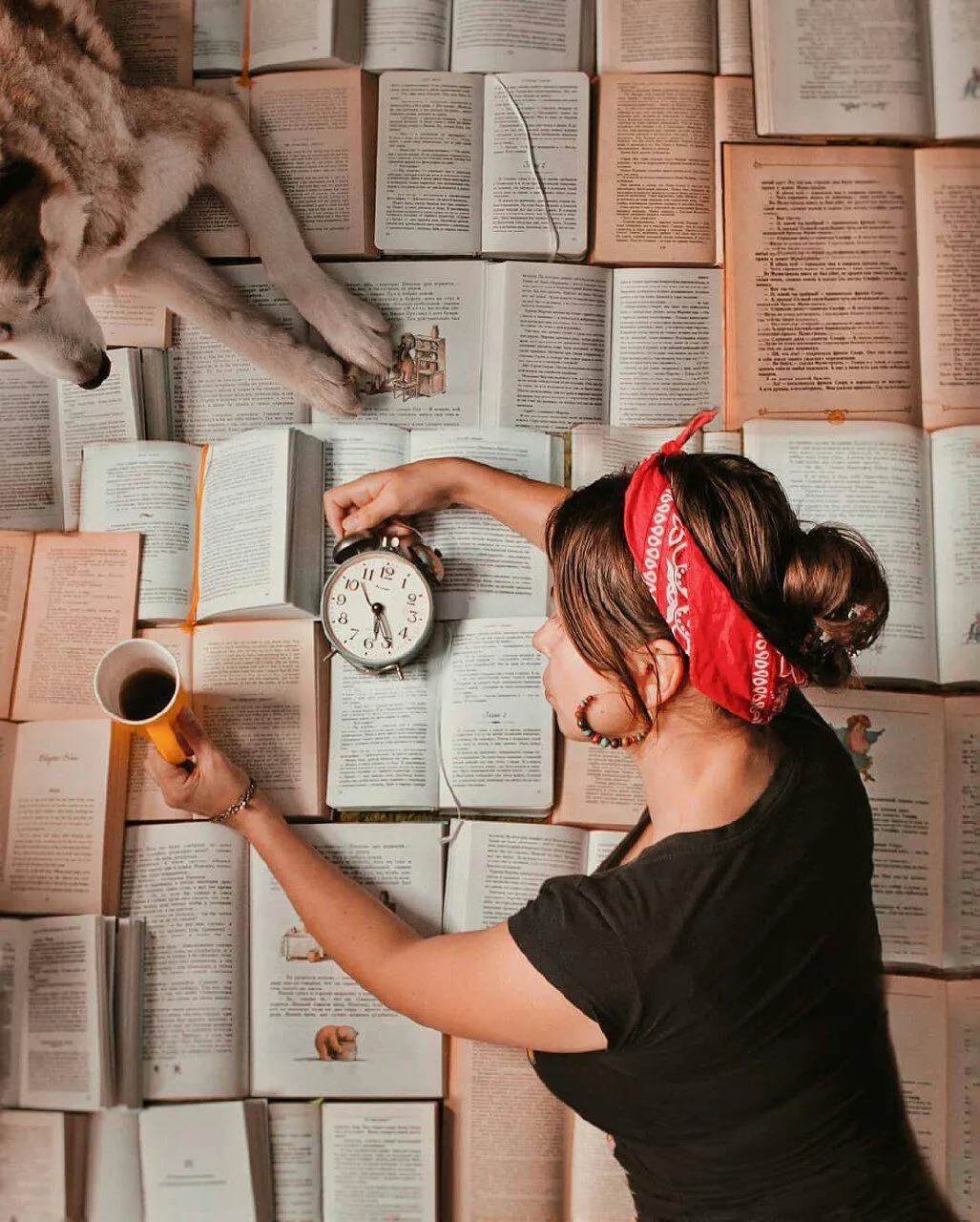 Artistic Girl Painting with Books And a Clock on the Wall