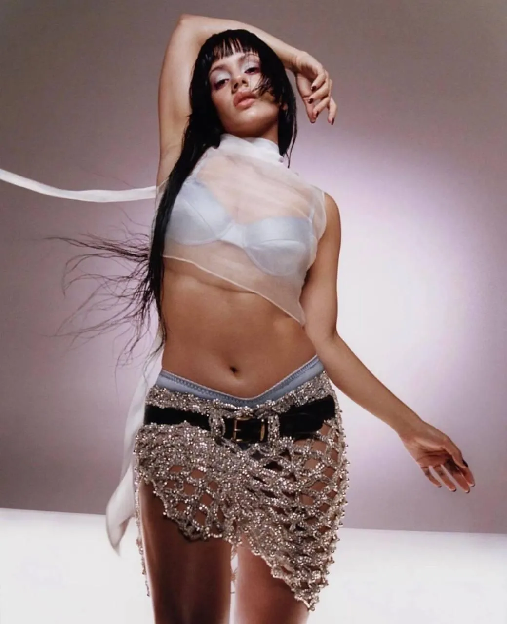 Artistic Photo of a Woman Dancing with Flowing Fabric Image