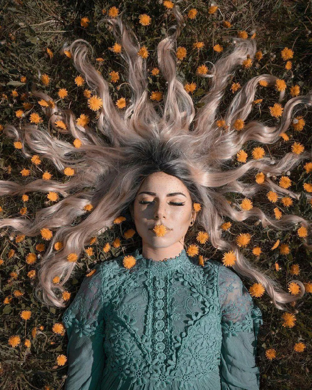 Artistic Portrait of a Woman Surrounded by Orange Curls