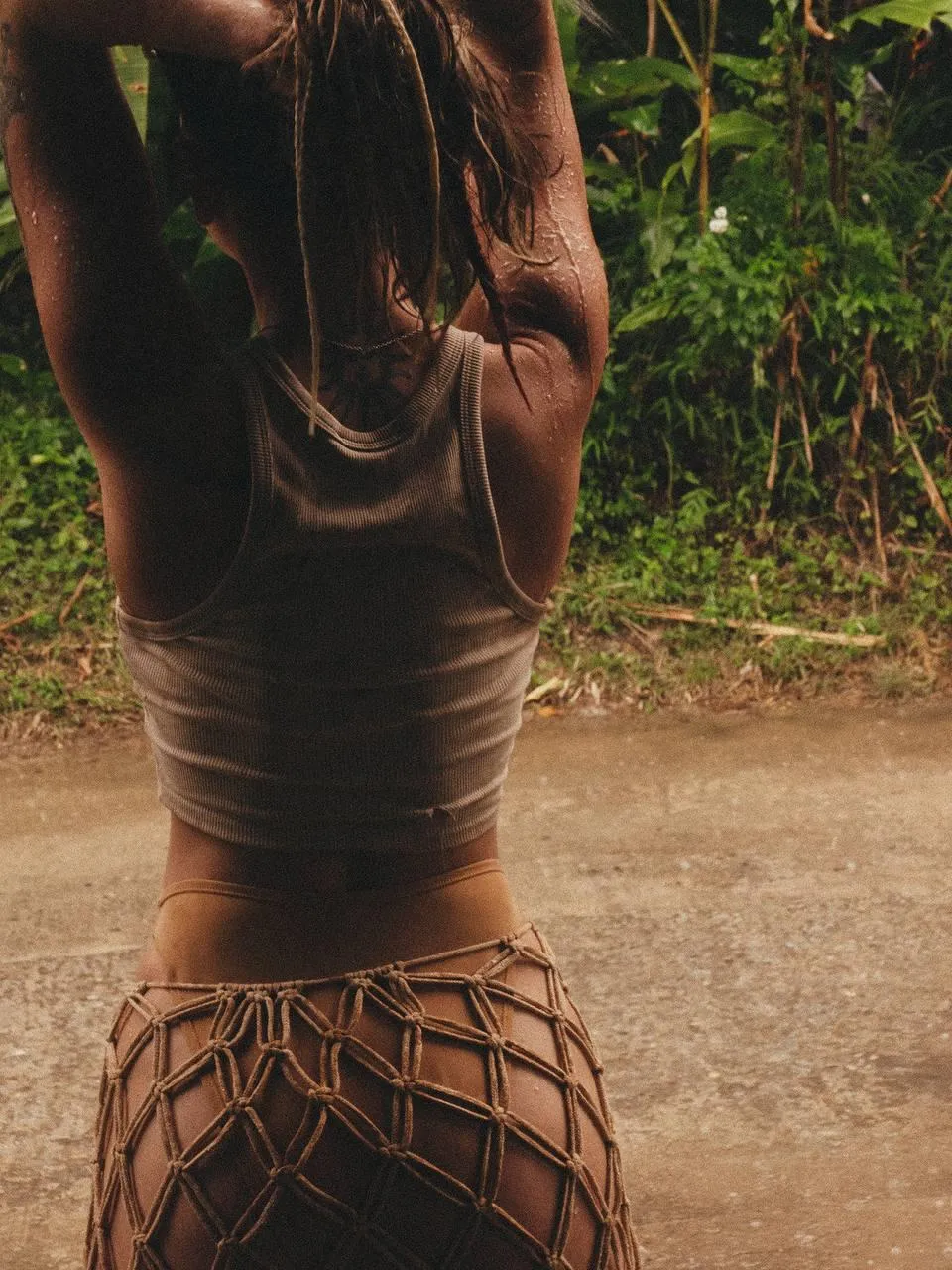 Artistic Silhouette of a Woman Standing in Golden Hour Light