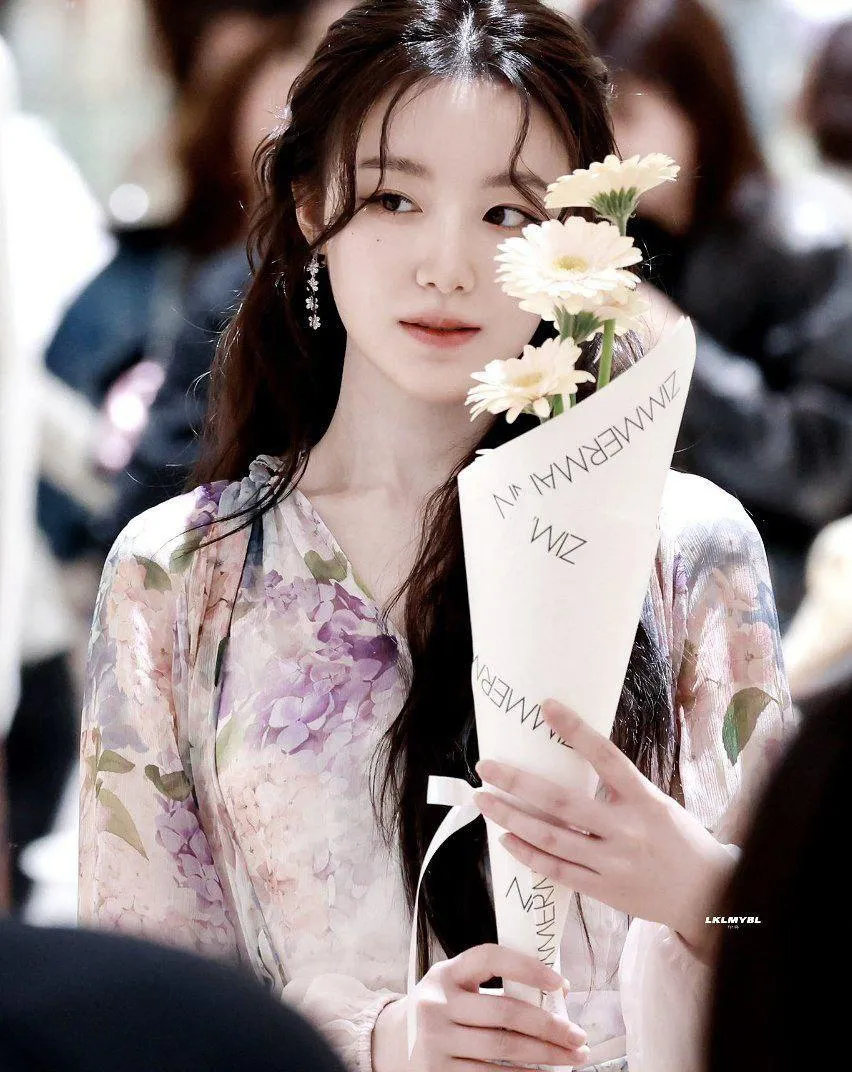 Beautiful Woman Moment Captured at an Event with Flower