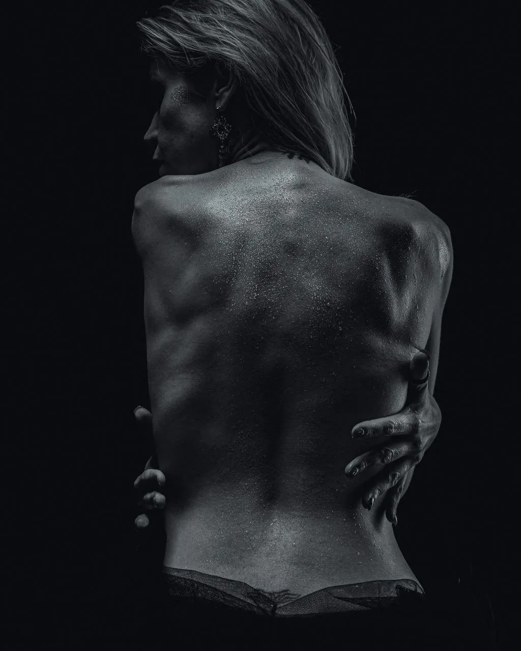 Black And White Back Profile Photo with Intense Shadows