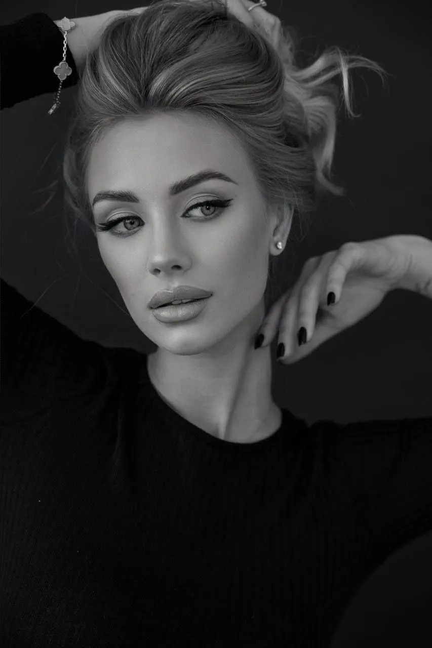 Black And White Close Up Portrait of a Woman in a Sweater