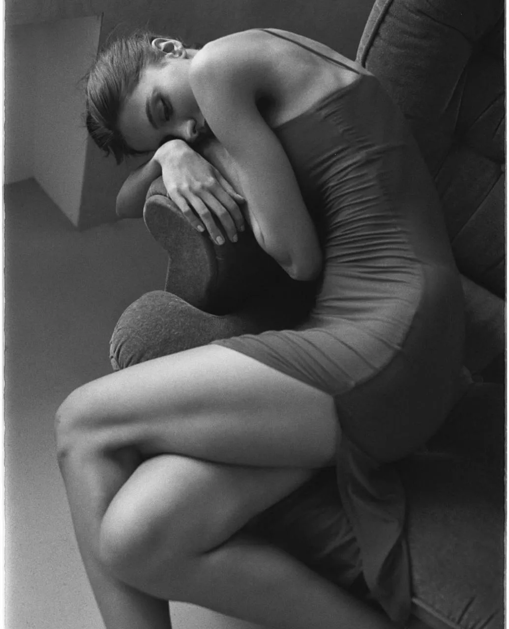 Black And White Curled Up Pose with Graceful Movement Image