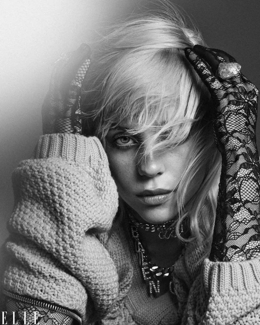 Black And White Portrait of a Woman in a Cozy Knit Sweater