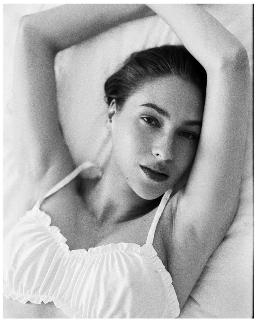 Black And White Portrait of a Woman in Relaxed Soft Pose
