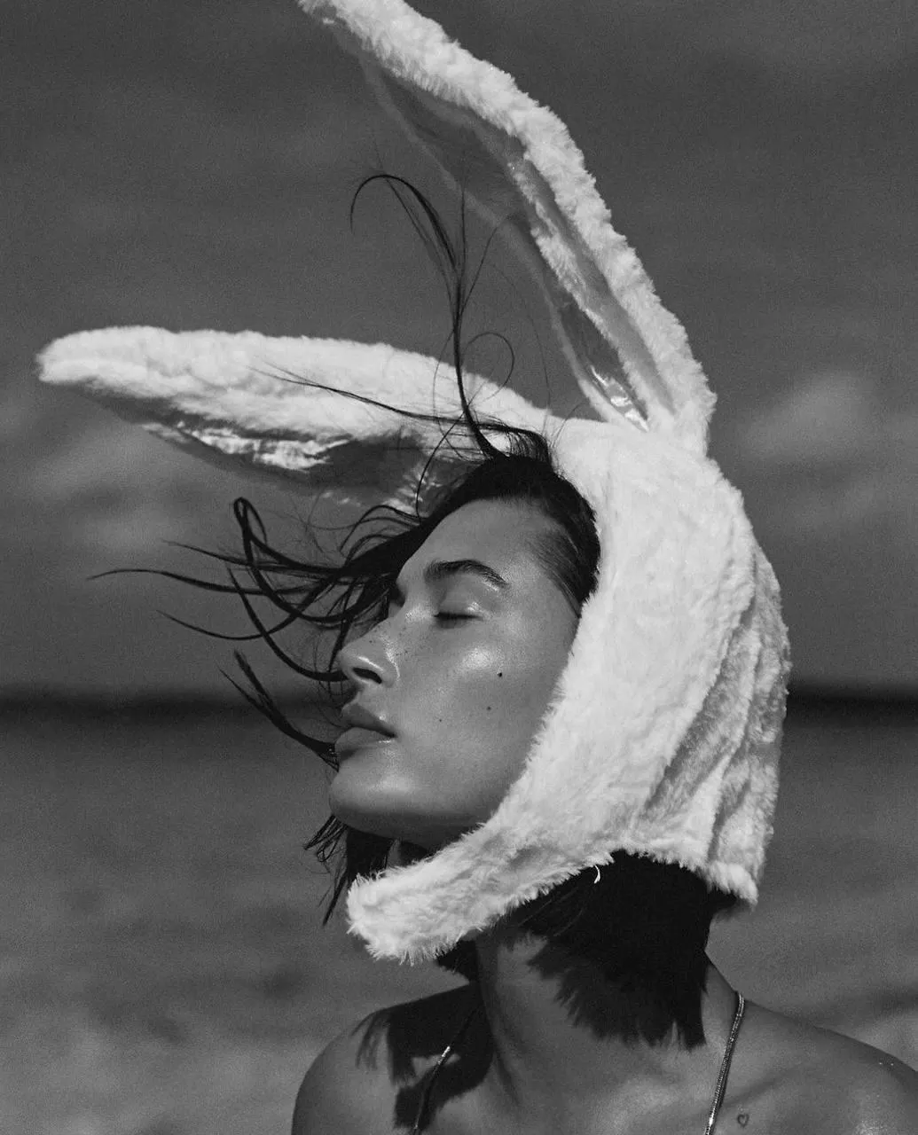Black And White Portrait of Woman Wearing a Fuzzy Bunny Hat