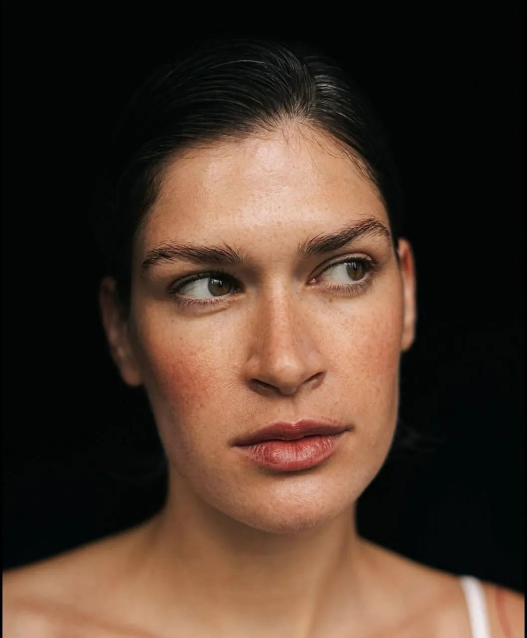 Close portrait of a confident woman with natural skin image