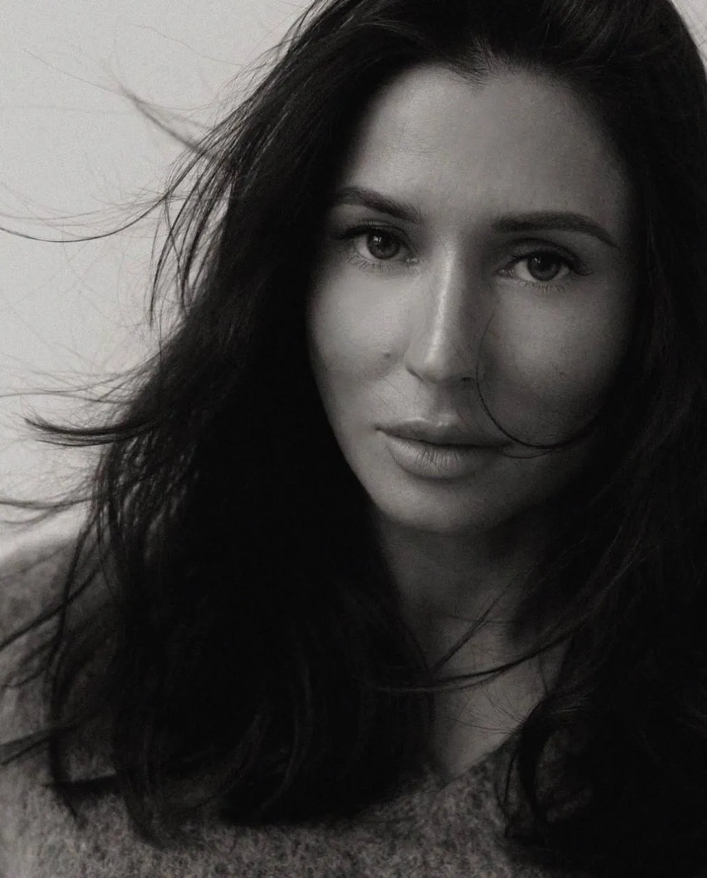 Close Up Black And White Portrait of a Woman with Curls