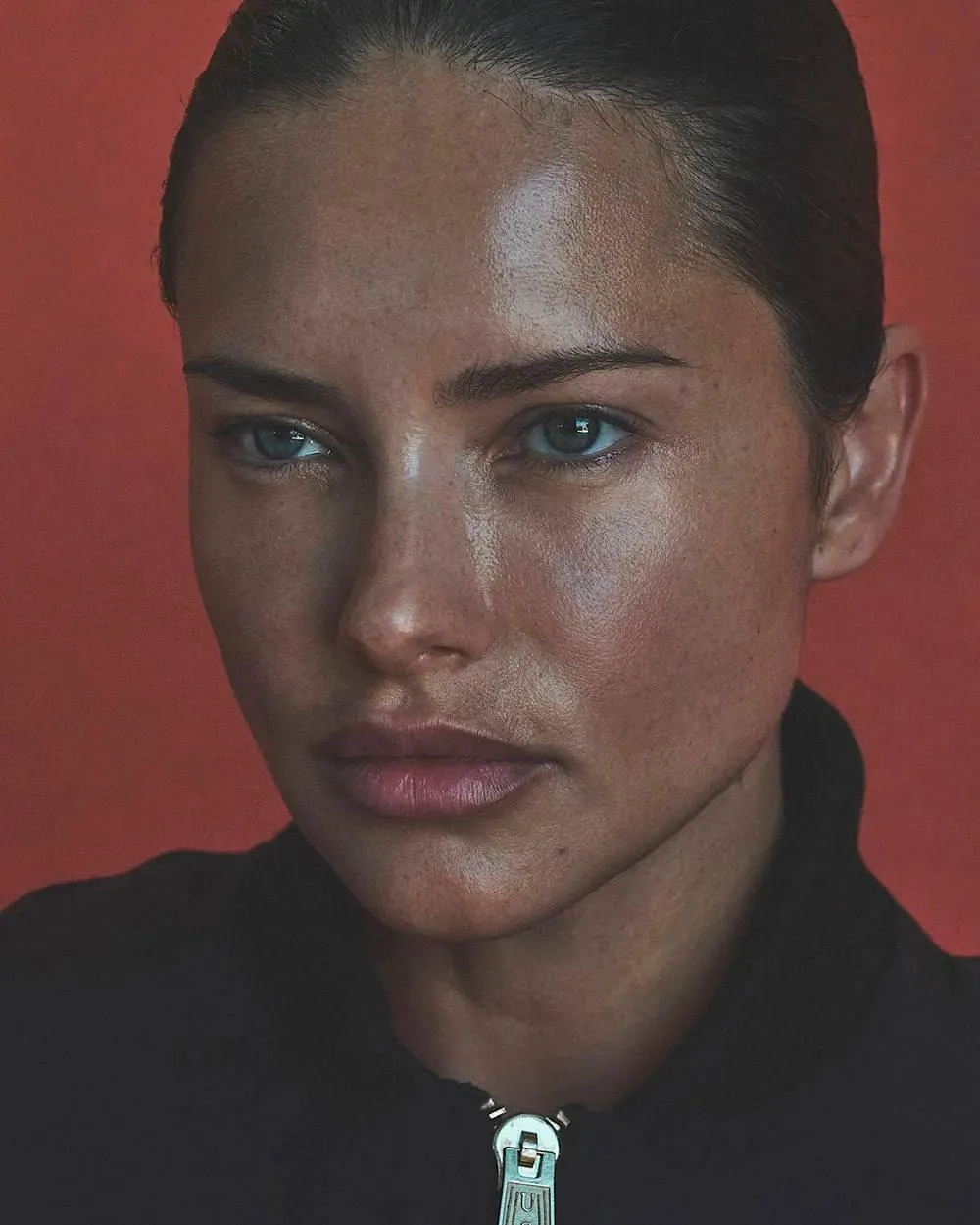 Close Up of a Woman with Glossy Skin And Serious Expression