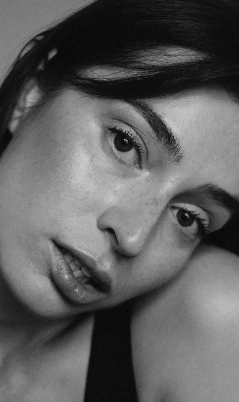 Close up portrait of a woman gazing into the camera image