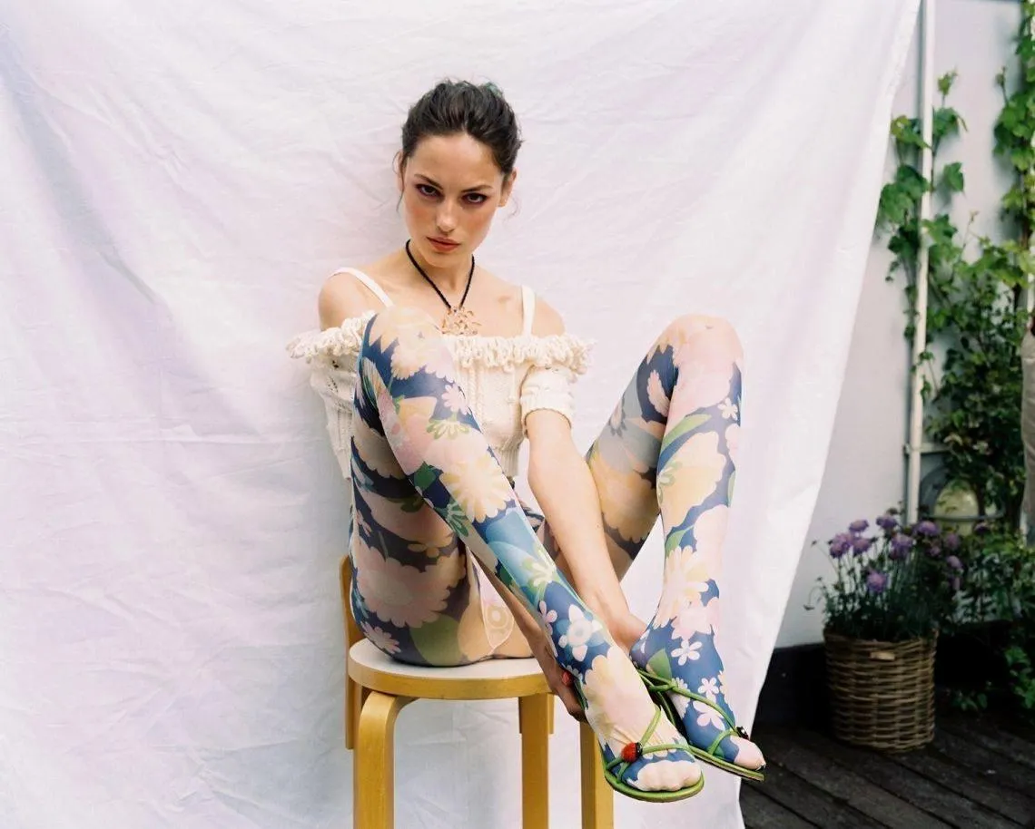 Creative Fashion Shot of Woman Wearing an Artistic Bodysuit