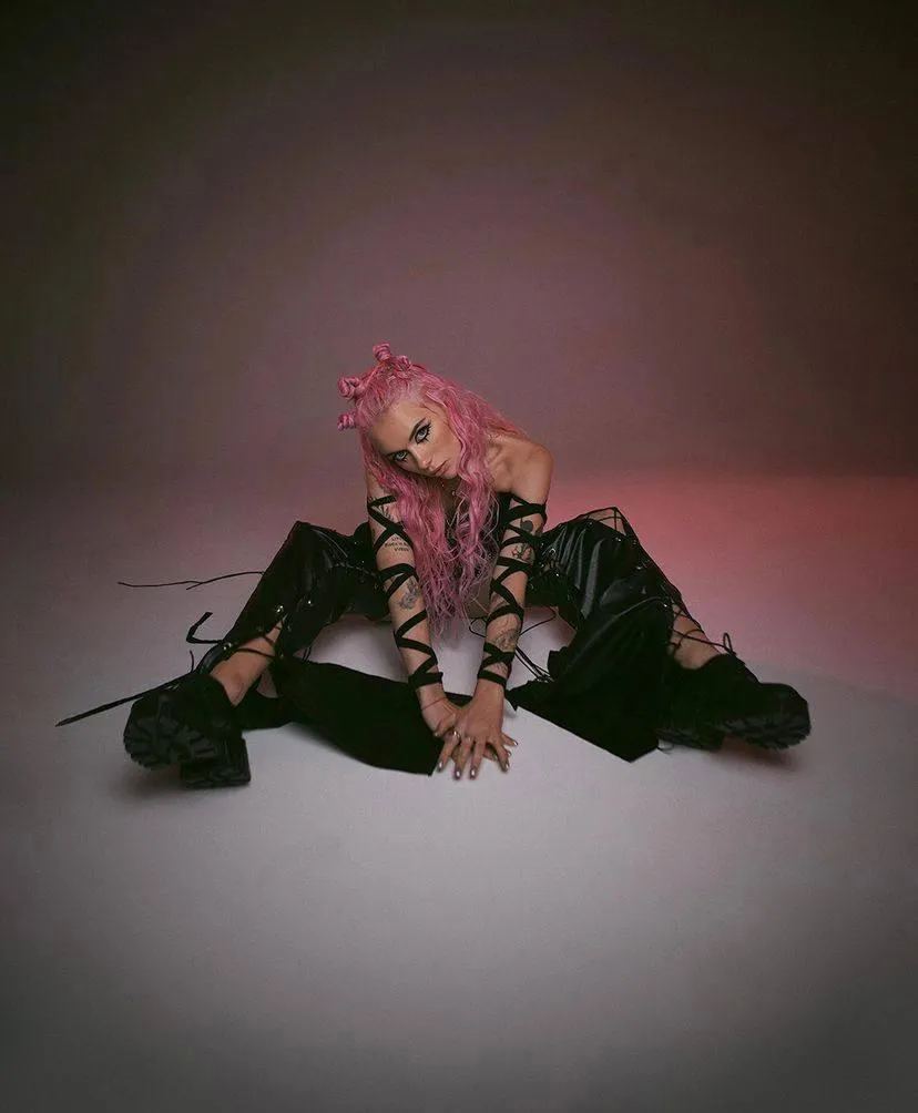 Creative glamour pose with woman on the floor in the studio