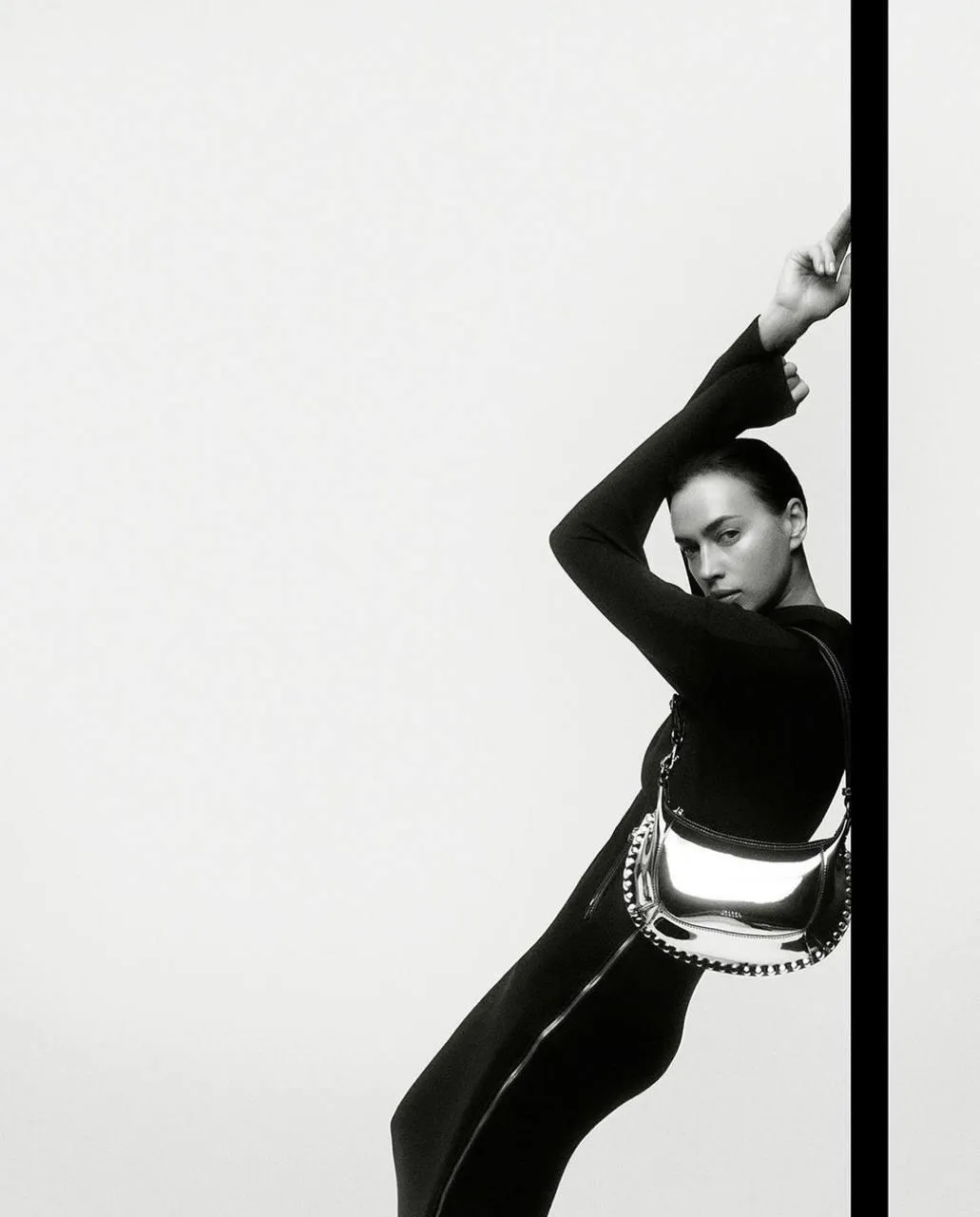 Dramatic photo of a woman leaning on the black line image