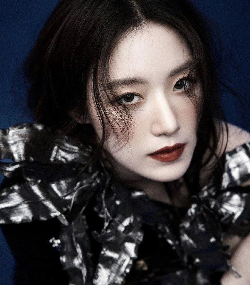 Dramatic Portrait of a Woman in a Patterned Black Jacket