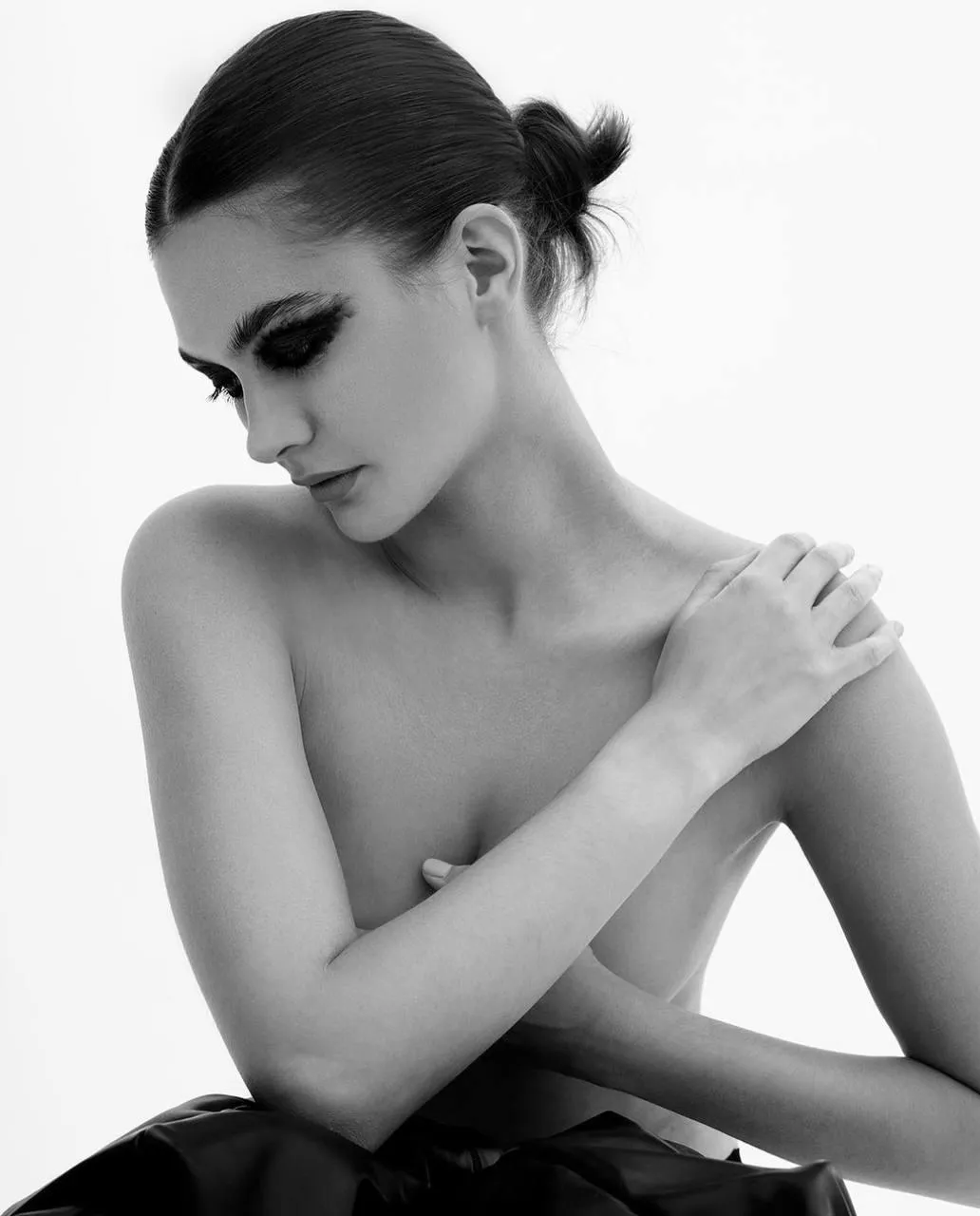 Elegant black and white portrait of a woman in a soft pose