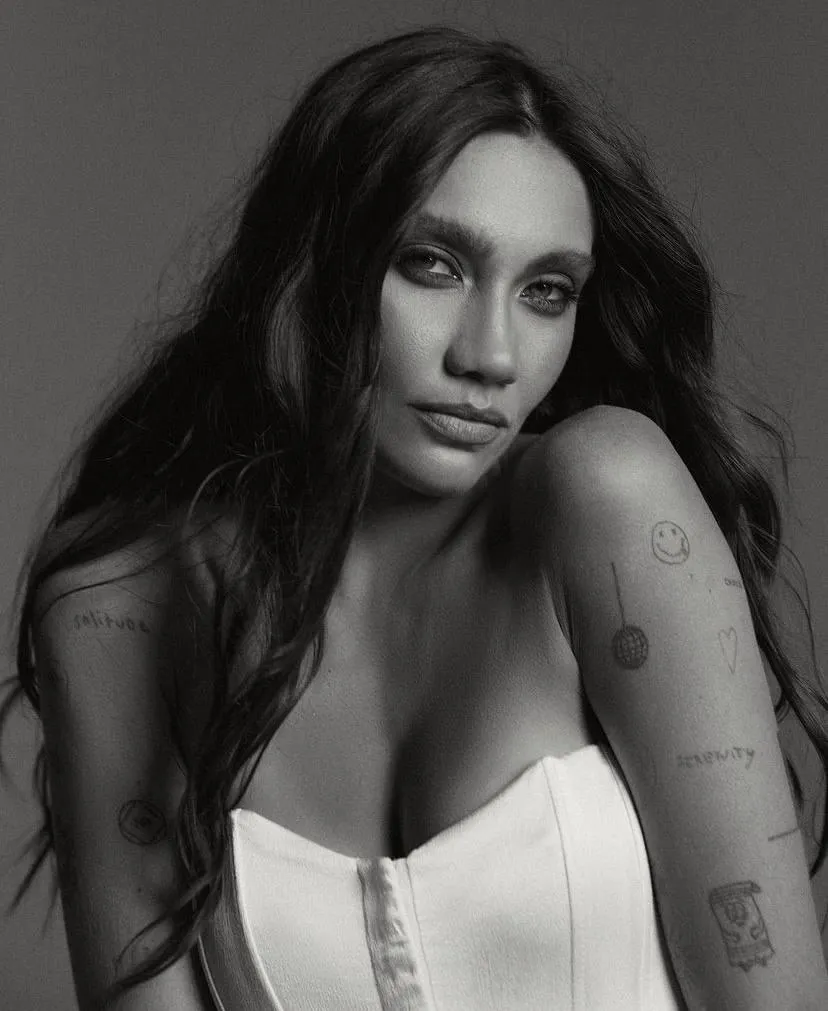 Elegant woman in white lingerie with dark flowing hair image