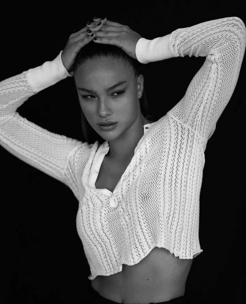 Fashion Model Wearing Cozy White Sweater in Black And White