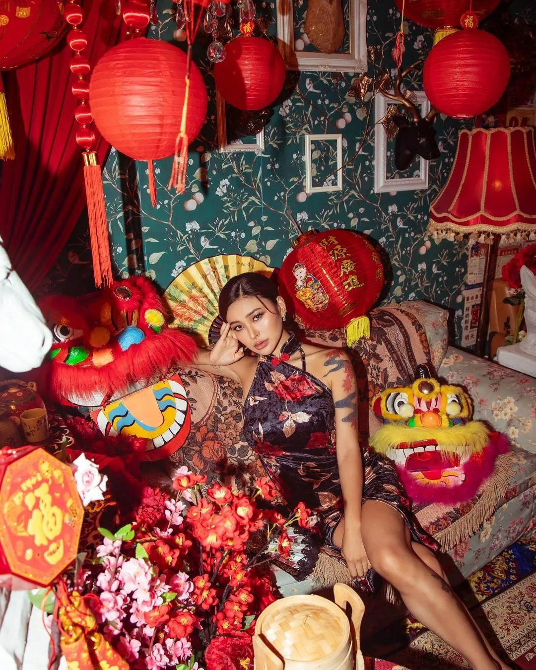 Festive Woman Lounging in a Colorful Red Lantern Setting