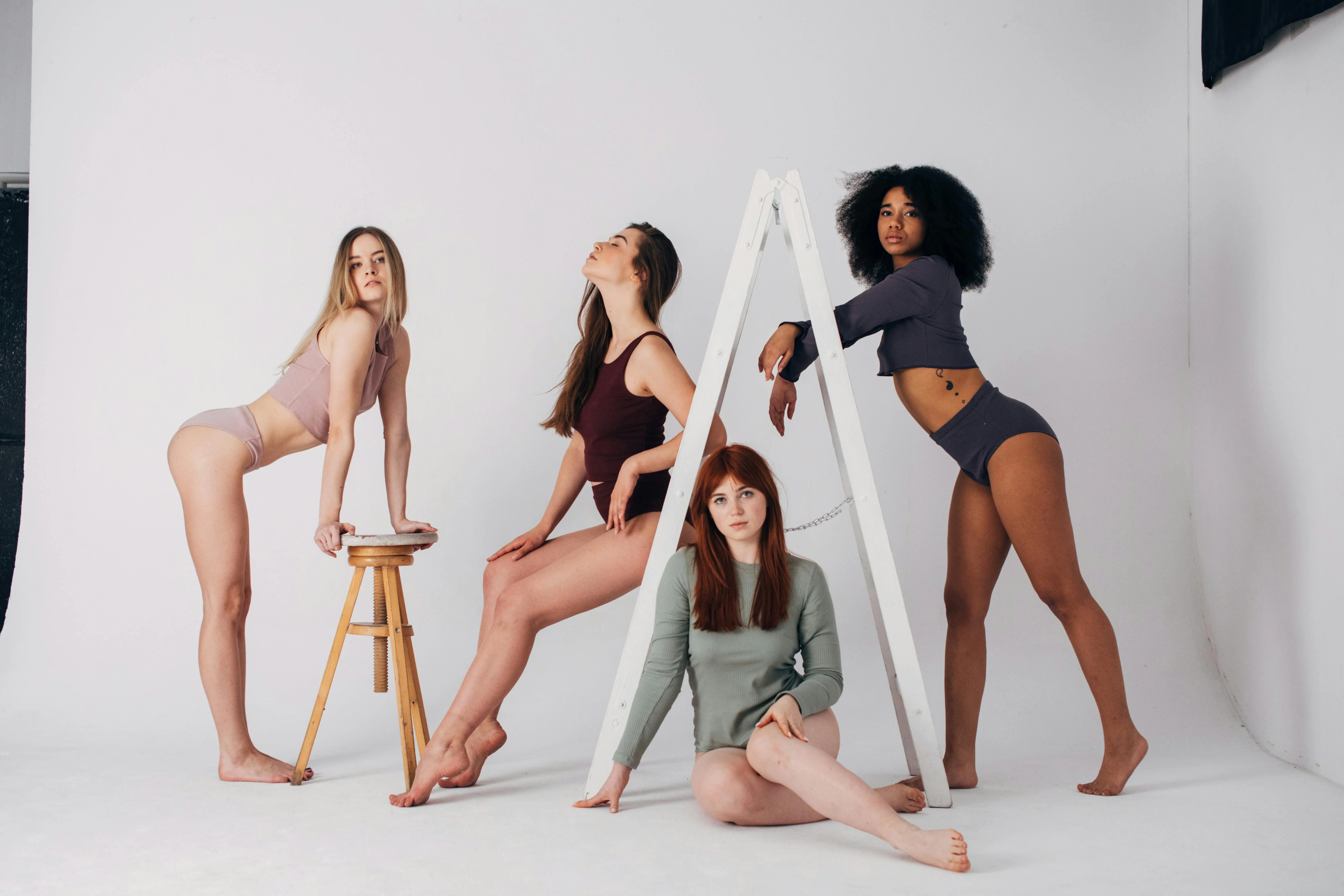 Group of Women Posing Confidently in a Studio Shoot Image