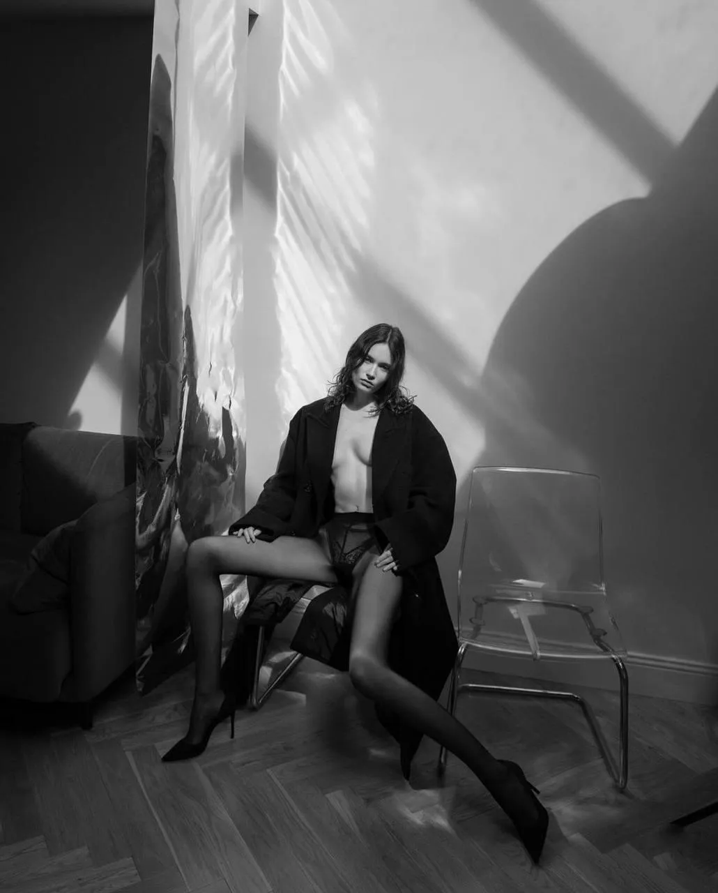 High fashion black and white photo with dramatic lighting