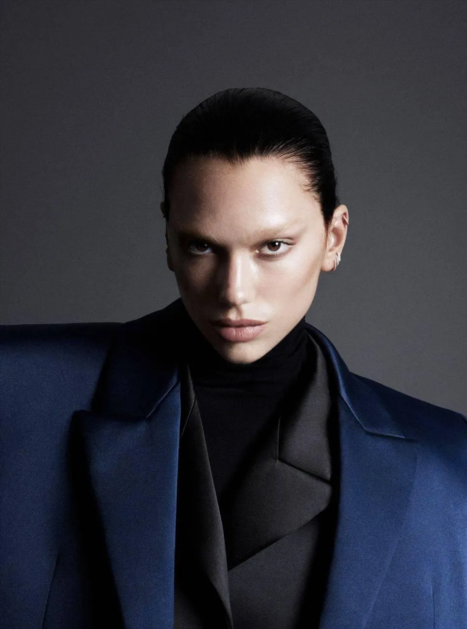 Man in a Blue Blazer Staring Intensely in a Fashion Portrait