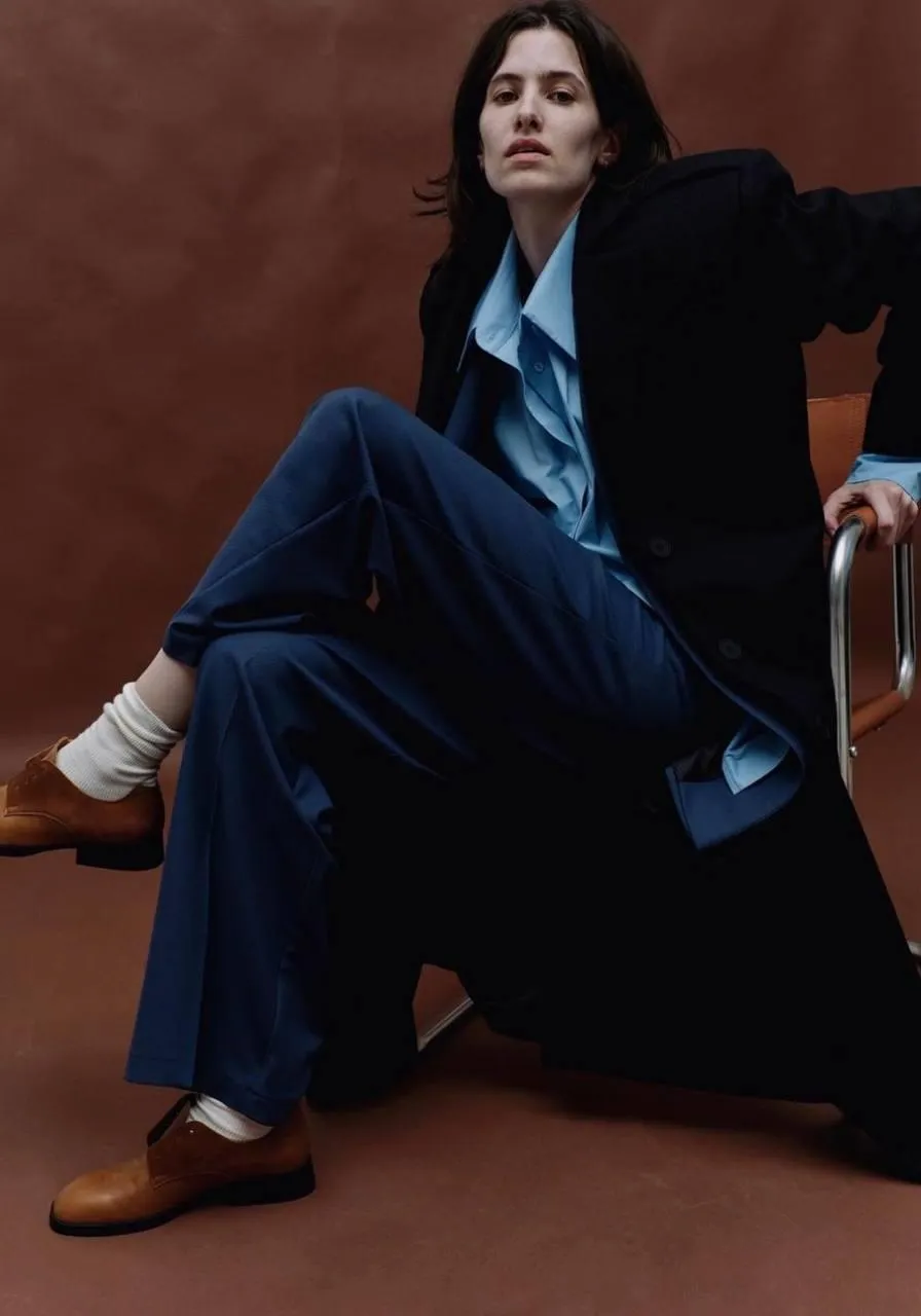Modern fashion portrait with oversized blazer and wide pants