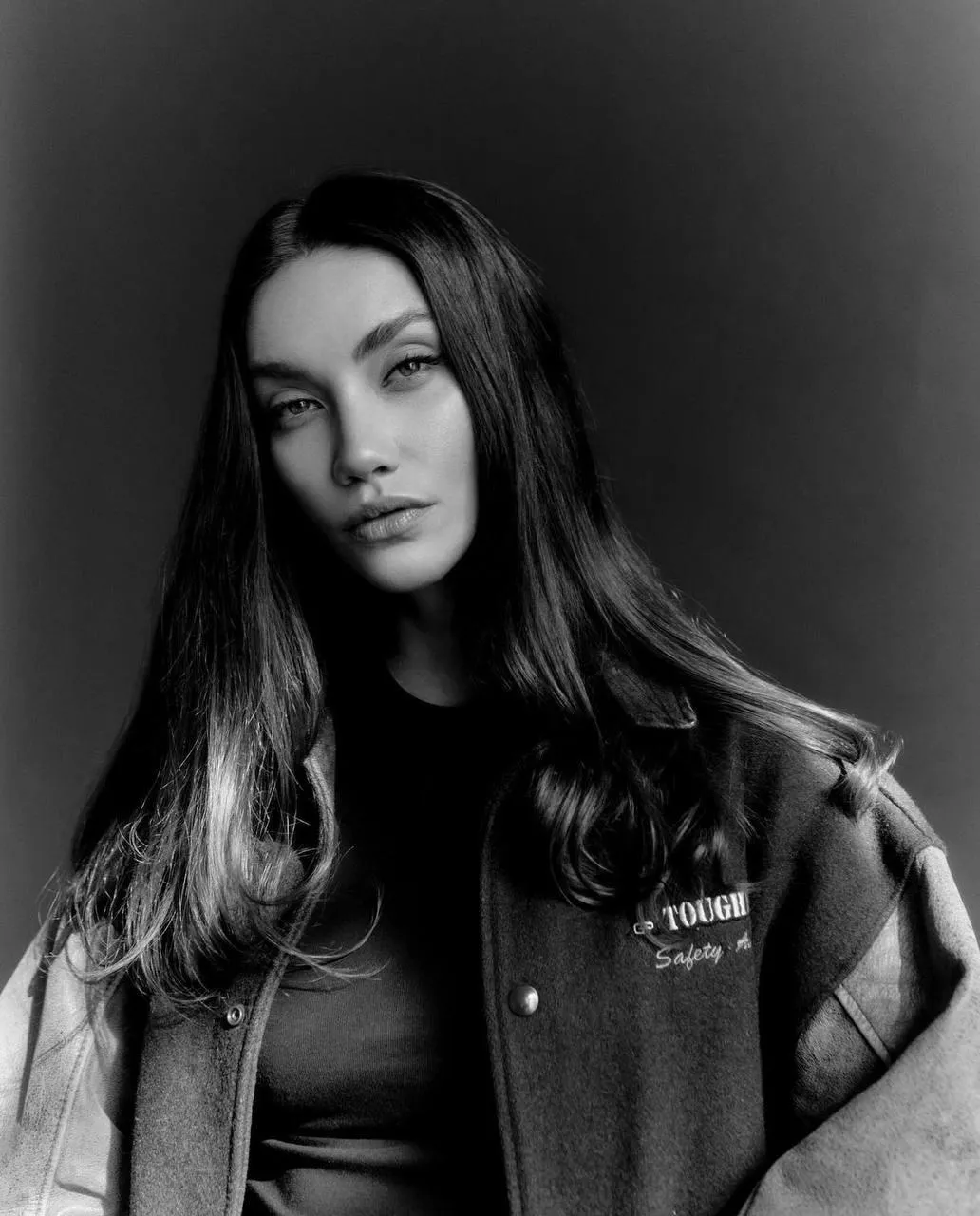 Monochrome Portrait of a Stylish Woman with Long Hair Image