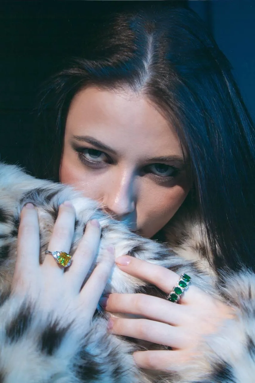 Mysterious Woman Hiding Face Behind Fur Coat Free Wallpaper